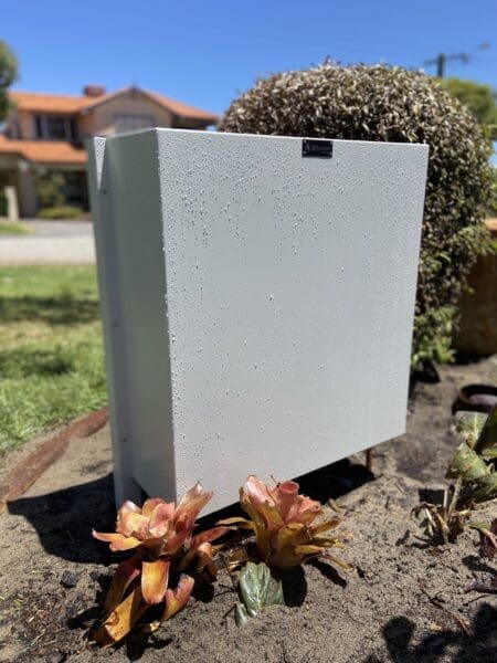 Water filter system box in front yard - Home Filtration Systems