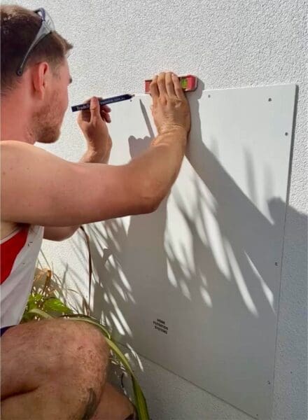 Man installing the standard Home Filtration Stystem